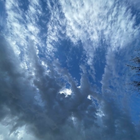 Light and dark clouds in a blue sky