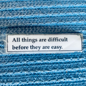 quote on laminated key tag